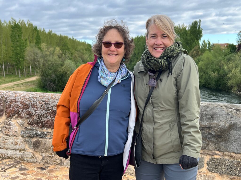 Linda Loewinger with a friend on the Camino in Spain.