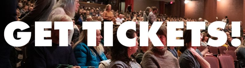 The image shows a group of people sitting in theater seats. the text GET TICKETS is superimposed over them.