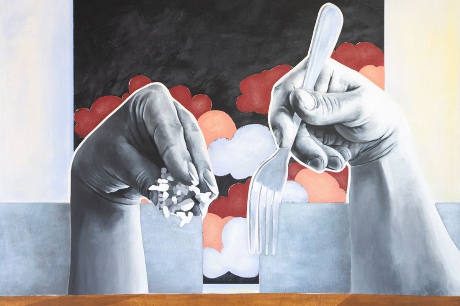 The image is a painting that depicts a darker hand holding food in its fingers. A lighter hand is to the right of the first hand and is holding a fork. The hands appear to be characters seated in chairs at a dinner table. In the background there appears to be a painting on a dark background of red, orange and white clouds.
